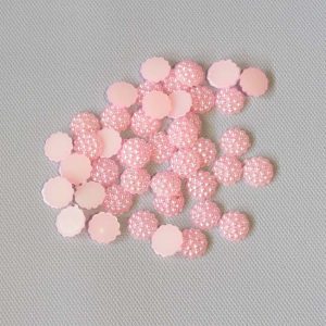 Полубусина в полусферах розовая за 10 грамм СерП-06